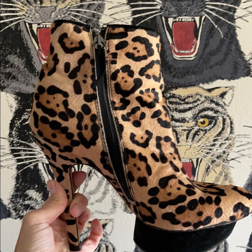 L.A.M.B. calf hair ankle booties.